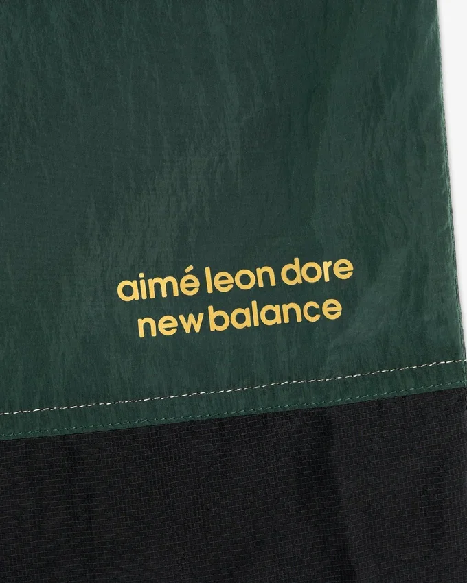 ALD / New Balance Lätta uppvärmningsbyxor i nylon