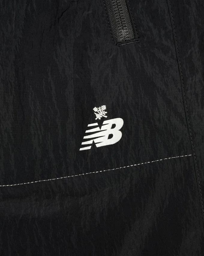 ALD / New Balance Lätta uppvärmningsbyxor i nylon