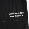 ALD / New Balance Lätta uppvärmningsbyxor i nylon