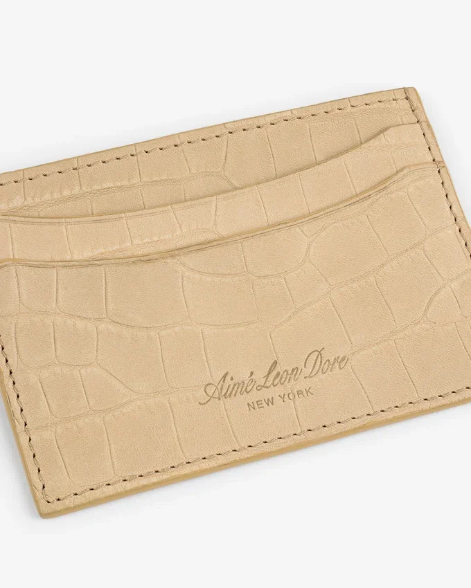 Kortfodral i nubuck med krokodilprägling