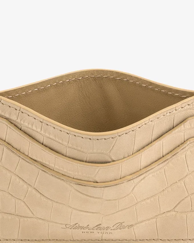 Kortfodral i nubuck med krokodilprägling