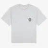 T-shirt med botaniskt emblem på fickan