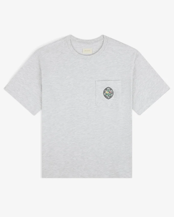 T-shirt med botaniskt emblem på fickan