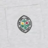 T-shirt med botaniskt emblem på fickan